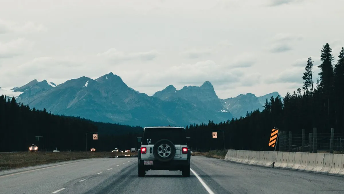 Vehicle bought with car financing driving an Alberta highway