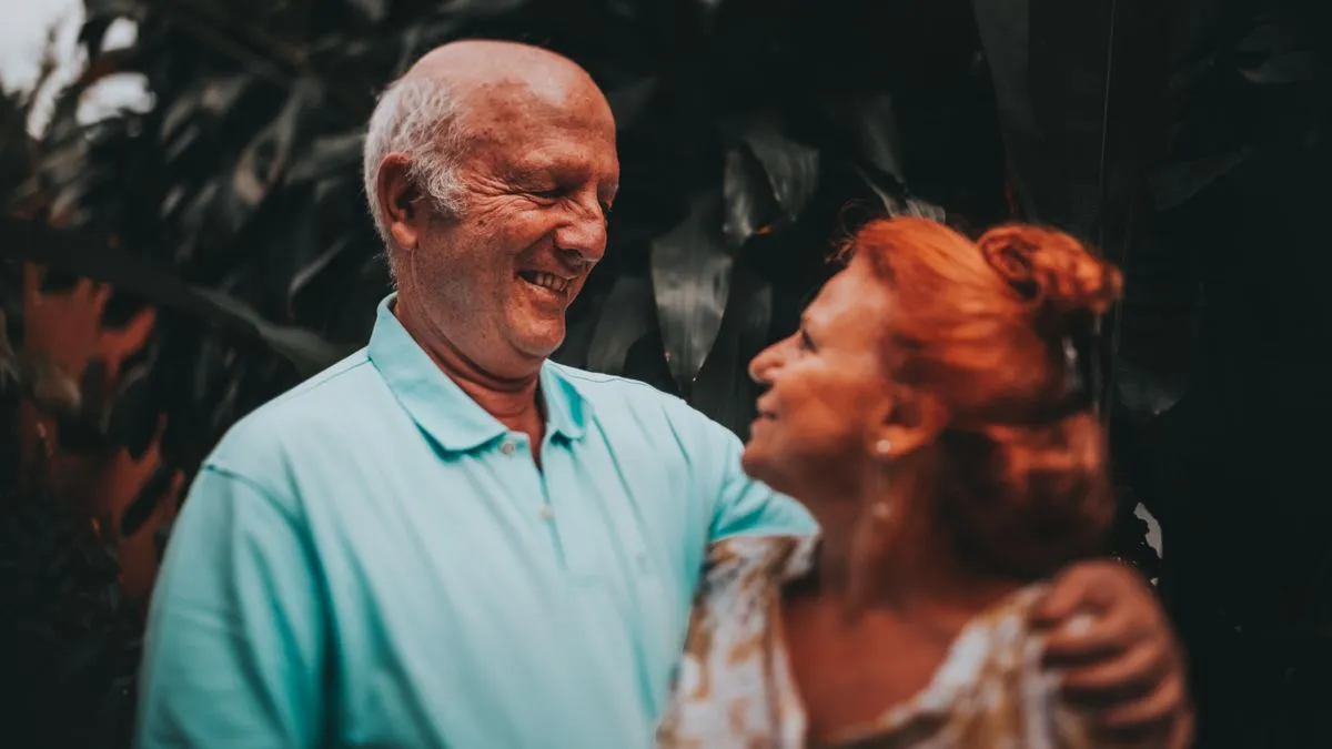 Happy retired Canadian couple who plan around their CPP payment dates each month