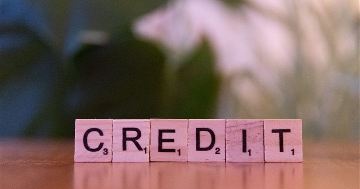 Wooden tiles spelling CREDIT representing credit reports and scores in Canada