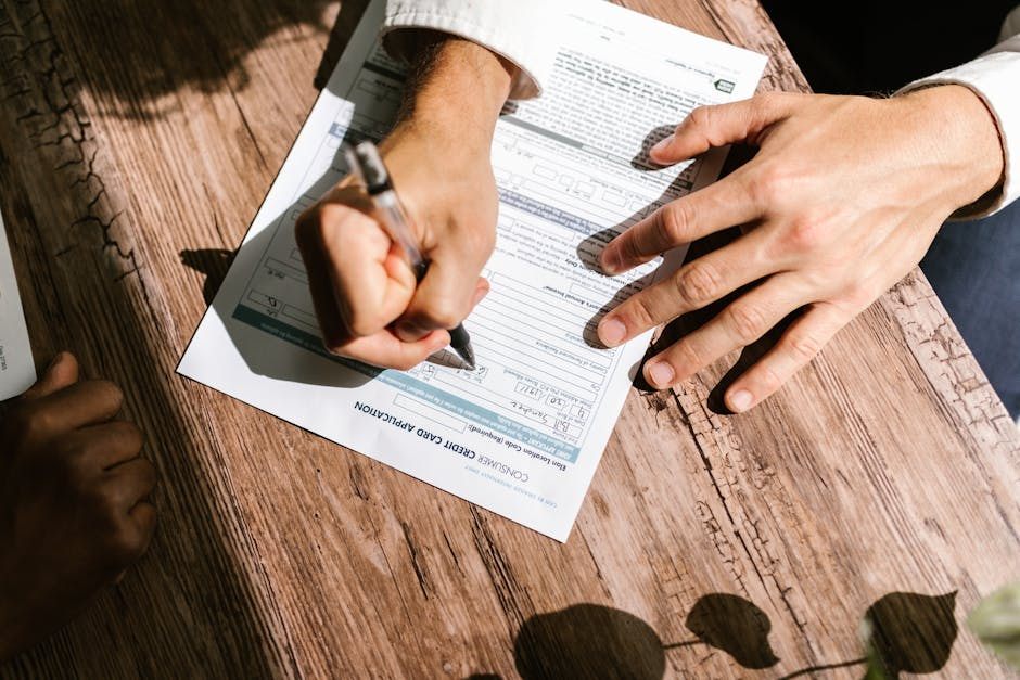 Person completing an online personal loan application in Canada