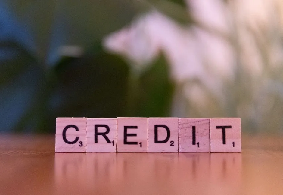 Wooden tiles spelling CREDIT illustrating how credit scores work in Canada