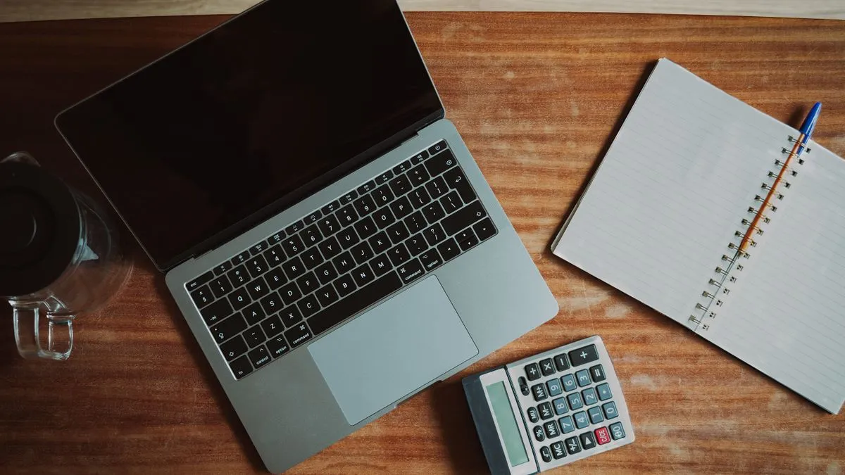 Desk setup for working through personal finance guides and planning