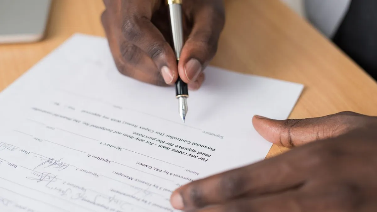 Signing personal loans agreement after comparing offers in Canada
