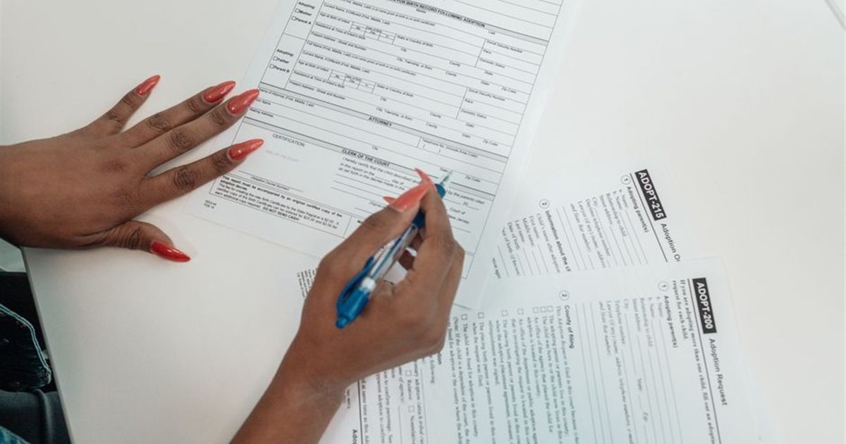 Filling out a government application form in Canada