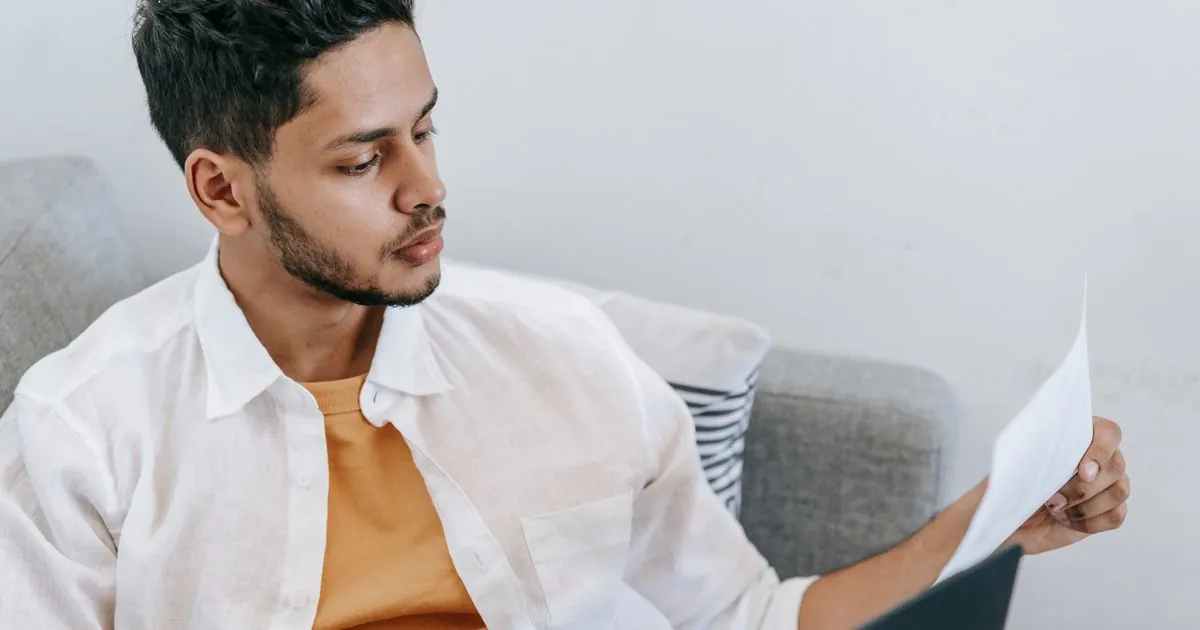 Reading loan terms at home after deciding to choose a loan online