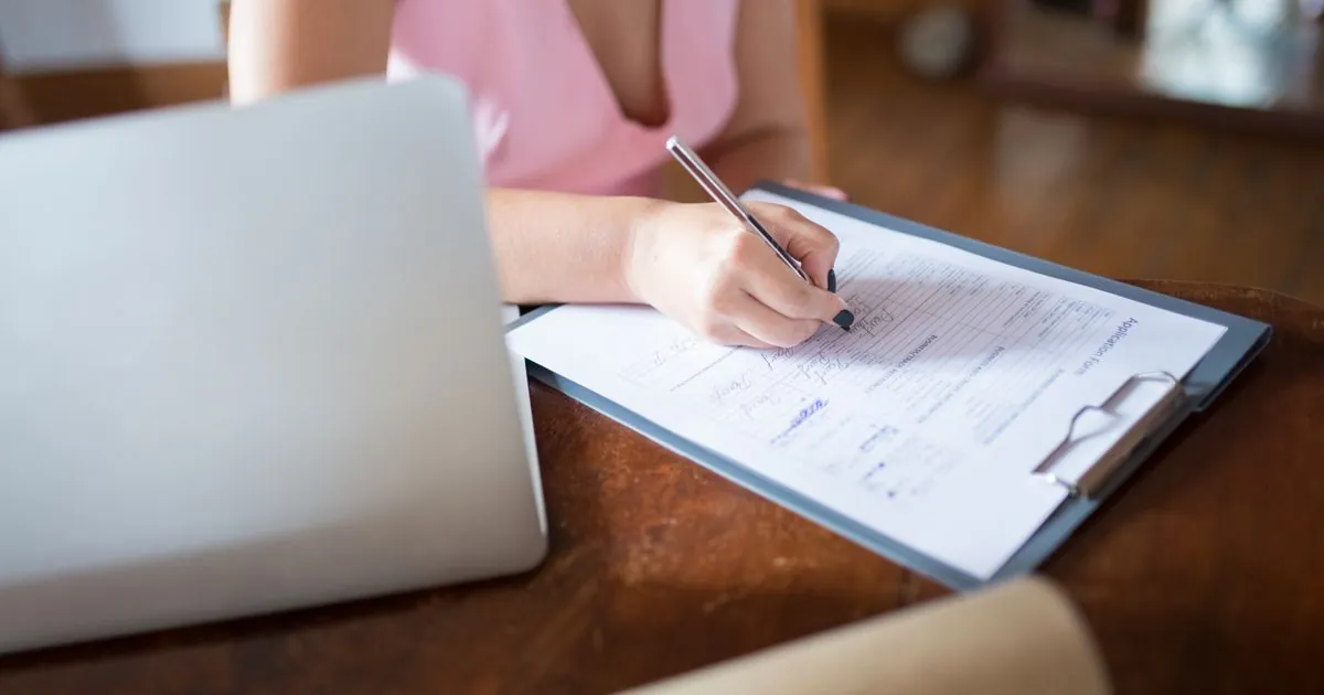 Filling out an application after working through how to choose a loan in Canada