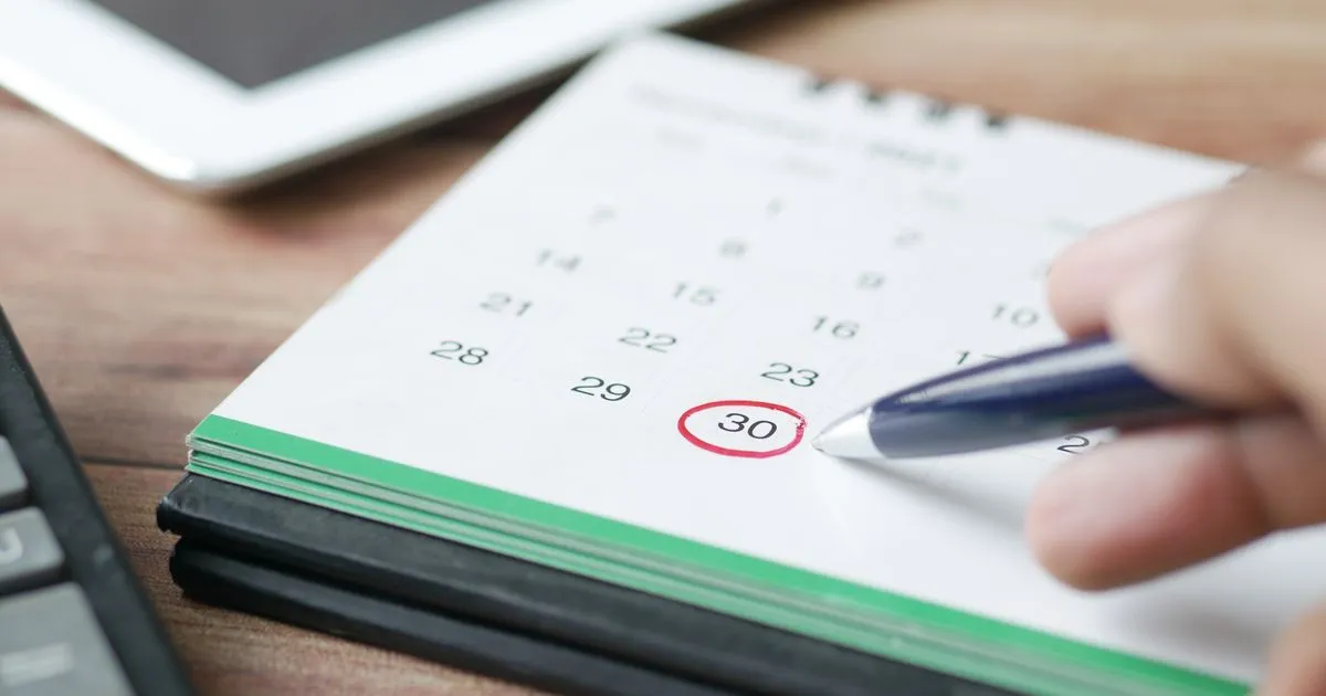 Ontario Works payment dates 2026 circled on a monthly desk calendar